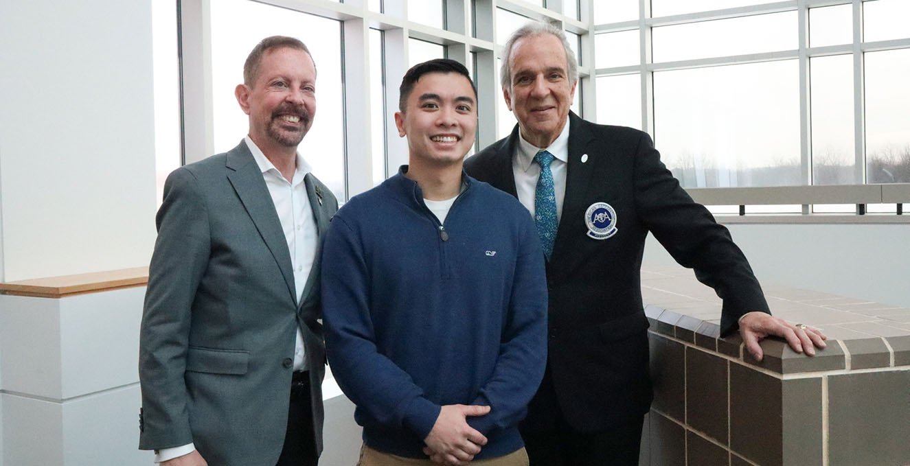 photo of Dr. Jermyn, Theo Manahan and alum Dr. Monka in the Academic Center
