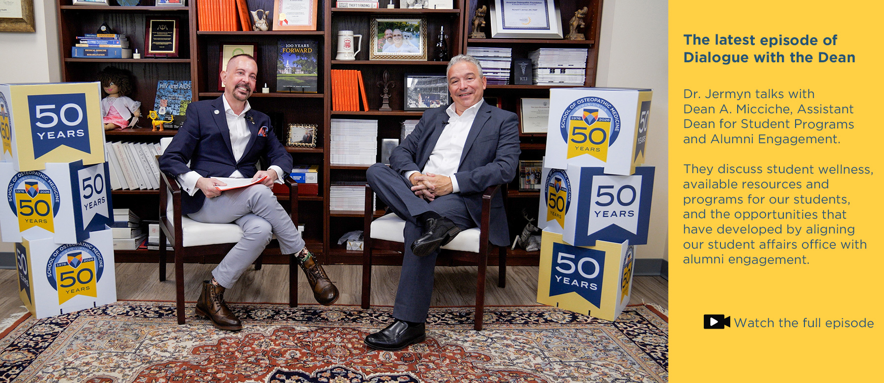 The latest episode of Dialogue with the Dean.Dr. Jermyn talks with Dean A. Micciche, Assistant Dean for Student Programs and Alumni Engagement. They discuss student wellness, available resources and programs for SOM students, and the opportunities that have developed by aligning our student affairs office with alumni engagement. Click to watch the full episode. Photo of Dr. Jermyn and Dean Micciche sitting in front of the bookcase in Jermyn's office while recording the vodcast.