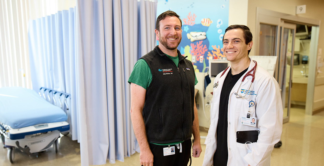 an SOM medical student and his mentor smile in a unit of the Virtua Voorhees hospital