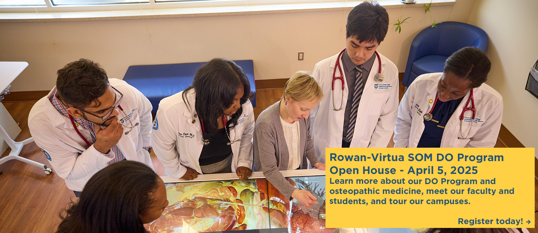 Register for the Rowan-Virtua SOM DO Program Open House on April 5. Students and a faculty member study an image on an anatomage table.