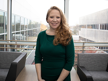 A smiling photo of Mary Duggan in the Rowan Medicine building